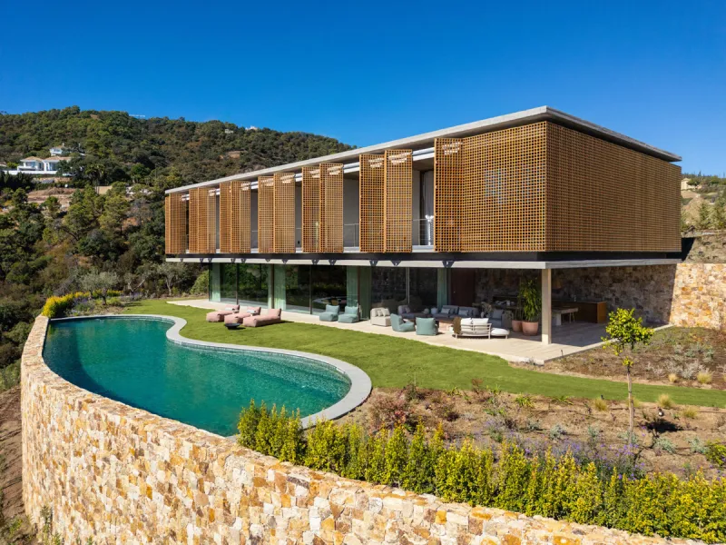 This Villa sets a new benchmark for refined living within the prestigious El Madroñal area in Benahavís.  Positioned in one of the most sought-after gated communities, the south-west facing villa offers sweeping panoramic views of the Mediterranean Sea an