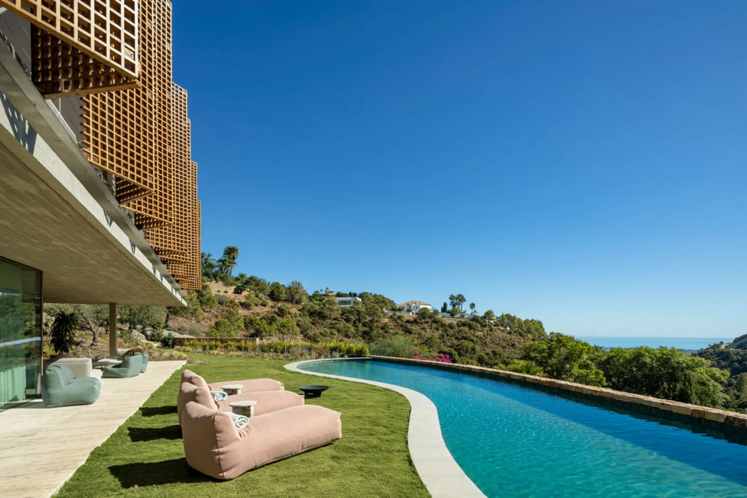 This Villa sets a new benchmark for refined living within the prestigious El Madroñal area in Benahavís.  Positioned in one of the most sought-after gated communities, the south-west facing villa offers sweeping panoramic views of the Mediterranean Sea an