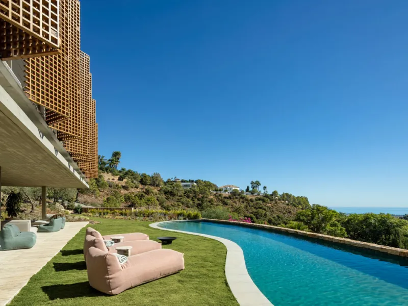 This Villa sets a new benchmark for refined living within the prestigious El Madroñal area in Benahavís.  Positioned in one of the most sought-after gated communities, the south-west facing villa offers sweeping panoramic views of the Mediterranean Sea an
