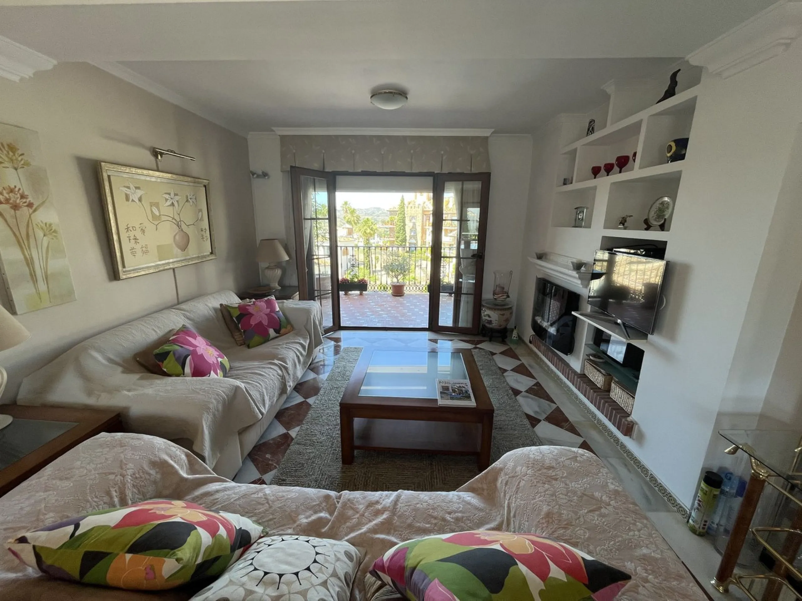 Welcome to this unique property situated in one of the most be beautiful complex on the Costa del Sol, Puebla Aida.  As you walk in you will find a landing leading onto the kitchen and a large living area with two terraces.  On this same landing there are