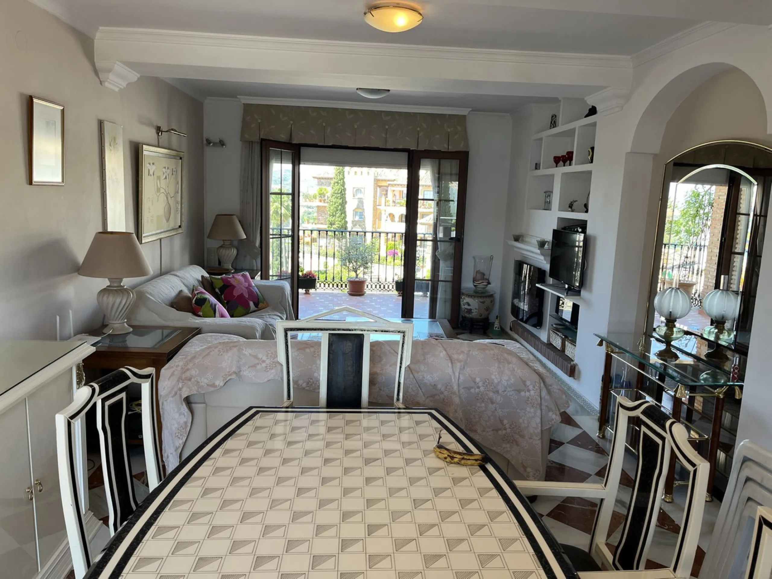 Welcome to this unique property situated in one of the most be beautiful complex on the Costa del Sol, Puebla Aida.  As you walk in you will find a landing leading onto the kitchen and a large living area with two terraces.  On this same landing there are
