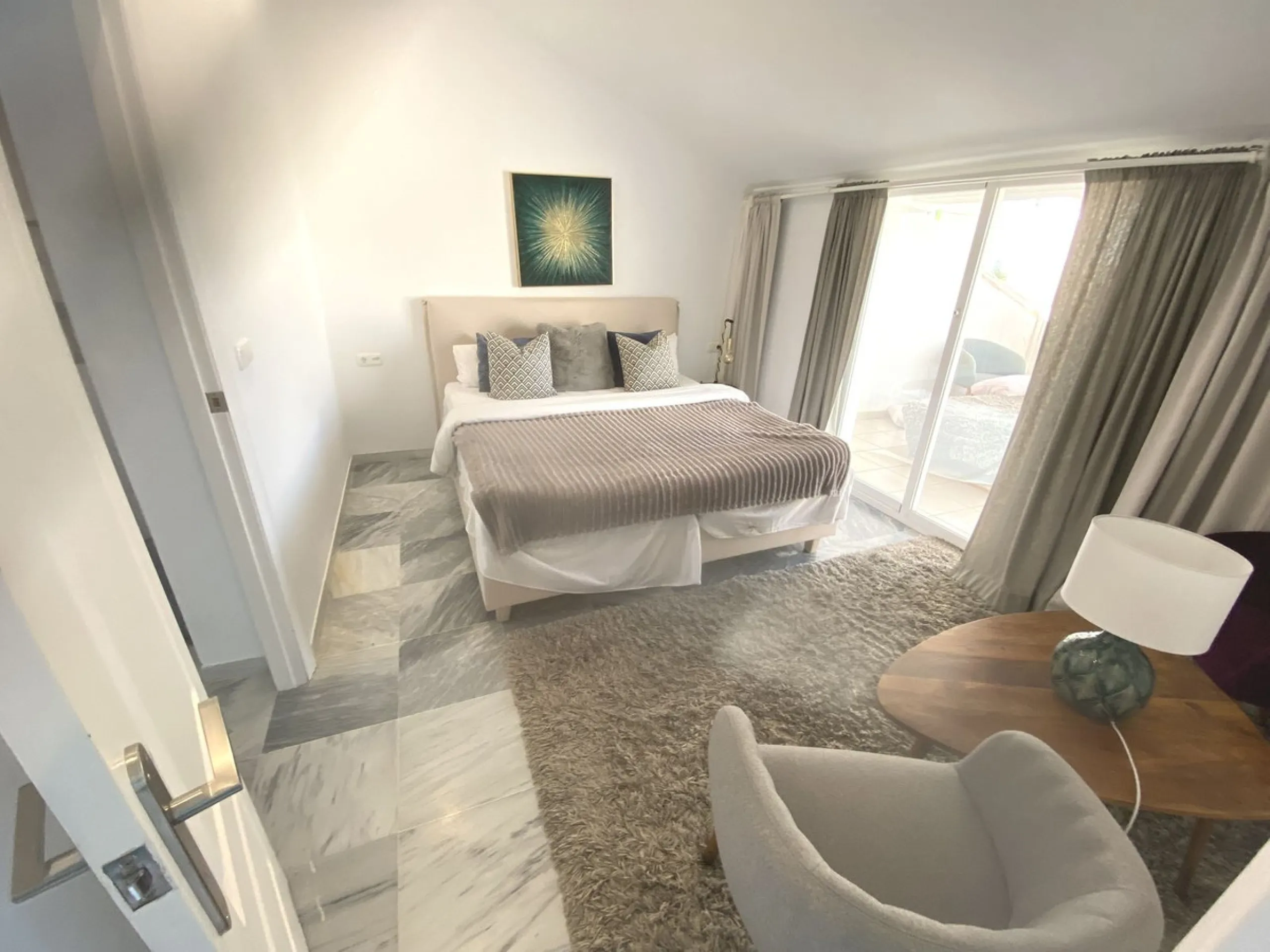 A superb west facing renovated duplex penthouse for sale in the popular El Dorado urbanisation in Nueva Andalucia, close to Puerto Banus