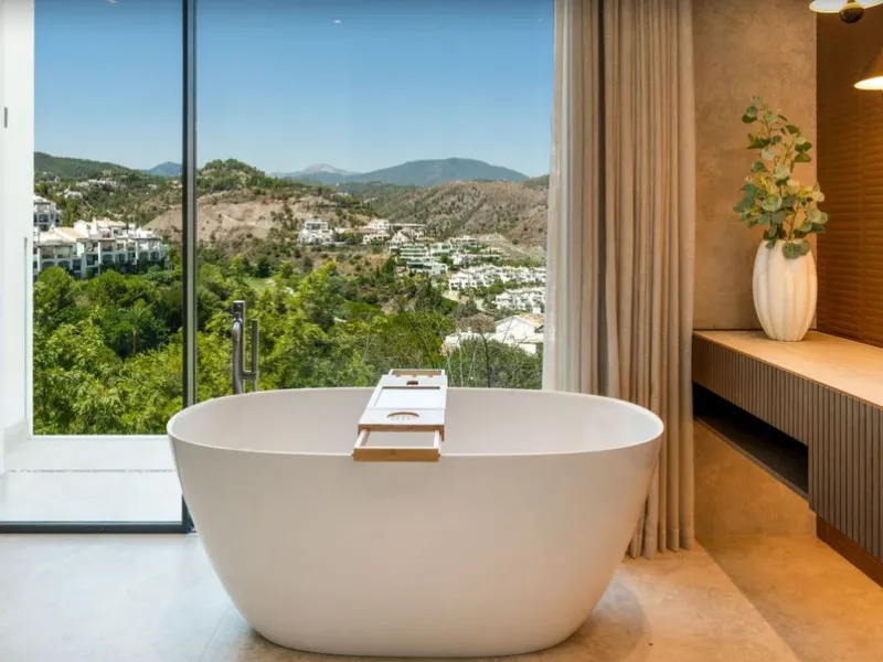 Nestled in the prestigious enclave of El Herrojo, within La Quinta, this remarkable six-bedroom villa embodies a seamless blend of traditional Andalusian charm and refined contemporary design. Recently refurbished to impeccable standards using premium mat