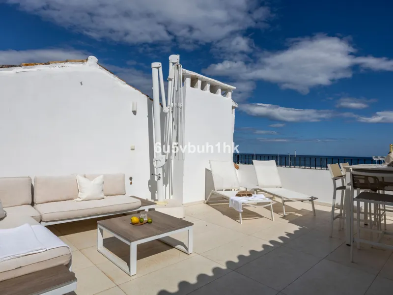 Discover this beautifully renovated duplex penthouse perfectly positioned in the vibrant heart of Puerto Banús, boasting spectacular views directly over the iconic marina.