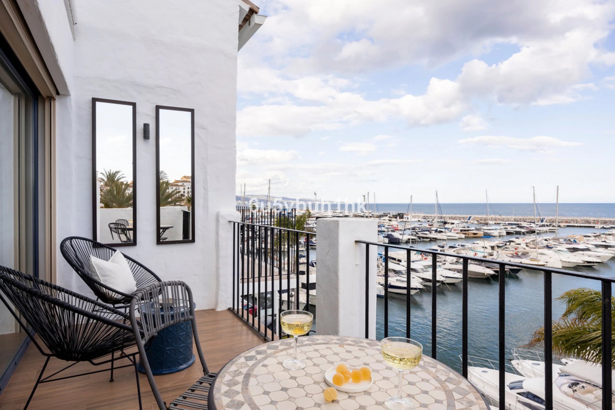 Discover this beautifully renovated duplex penthouse perfectly positioned in the vibrant heart of Puerto Banús, boasting spectacular views directly over the iconic marina.