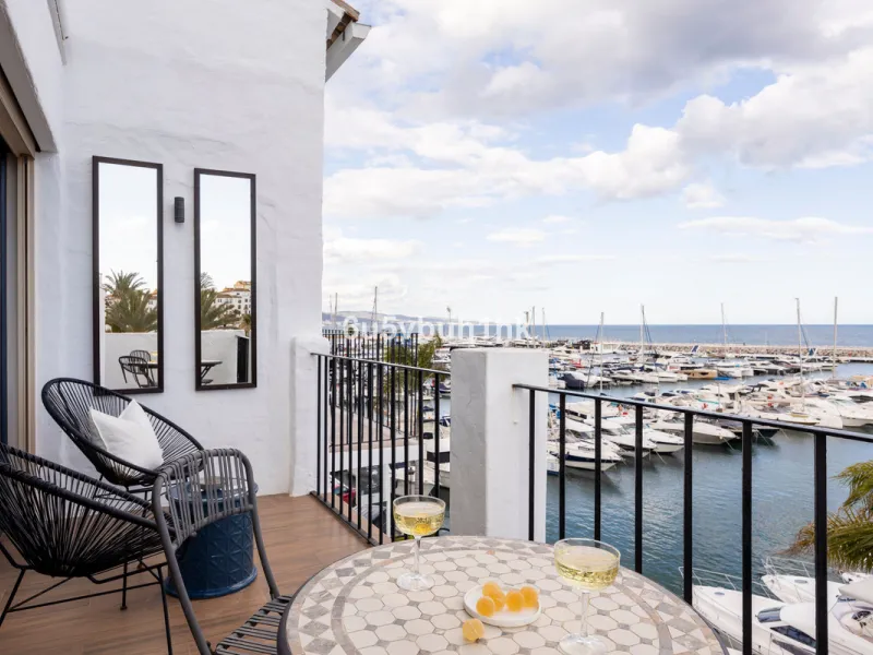 Discover this beautifully renovated duplex penthouse perfectly positioned in the vibrant heart of Puerto Banús, boasting spectacular views directly over the iconic marina.