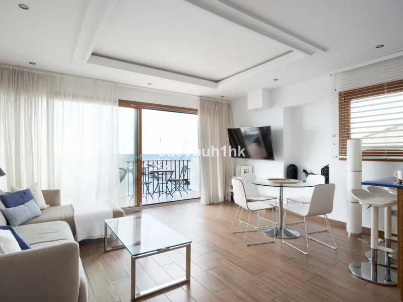 Discover this beautifully renovated duplex penthouse perfectly positioned in the vibrant heart of Puerto Banús, boasting spectacular views directly over the iconic marina.