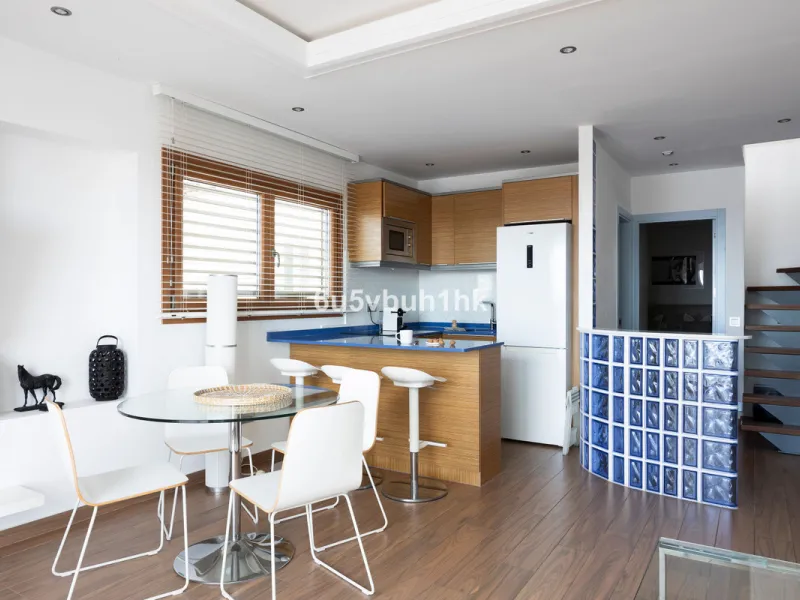Discover this beautifully renovated duplex penthouse perfectly positioned in the vibrant heart of Puerto Banús, boasting spectacular views directly over the iconic marina.
