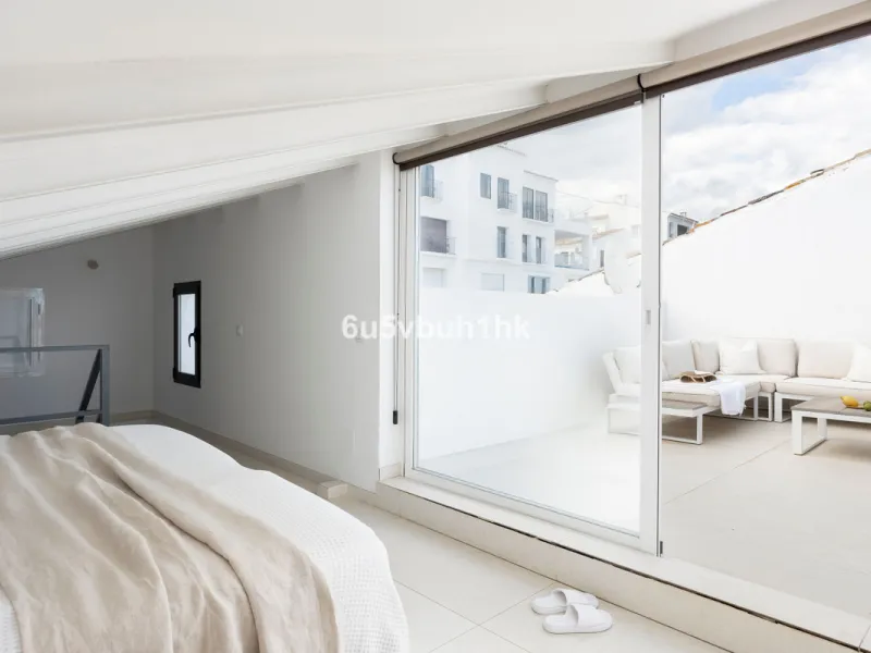 Discover this beautifully renovated duplex penthouse perfectly positioned in the vibrant heart of Puerto Banús, boasting spectacular views directly over the iconic marina.