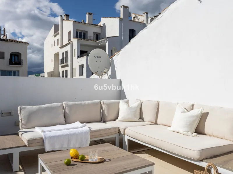 Discover this beautifully renovated duplex penthouse perfectly positioned in the vibrant heart of Puerto Banús, boasting spectacular views directly over the iconic marina.
