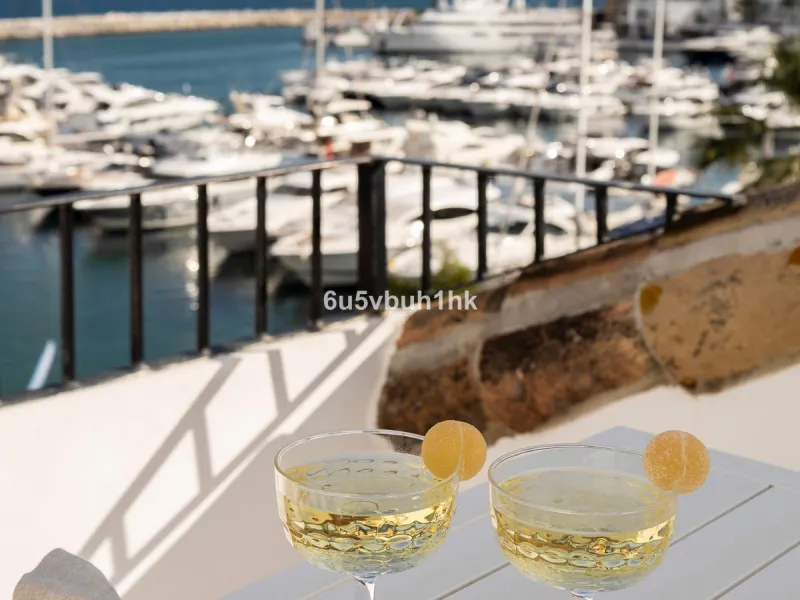 Discover this beautifully renovated duplex penthouse perfectly positioned in the vibrant heart of Puerto Banús, boasting spectacular views directly over the iconic marina.