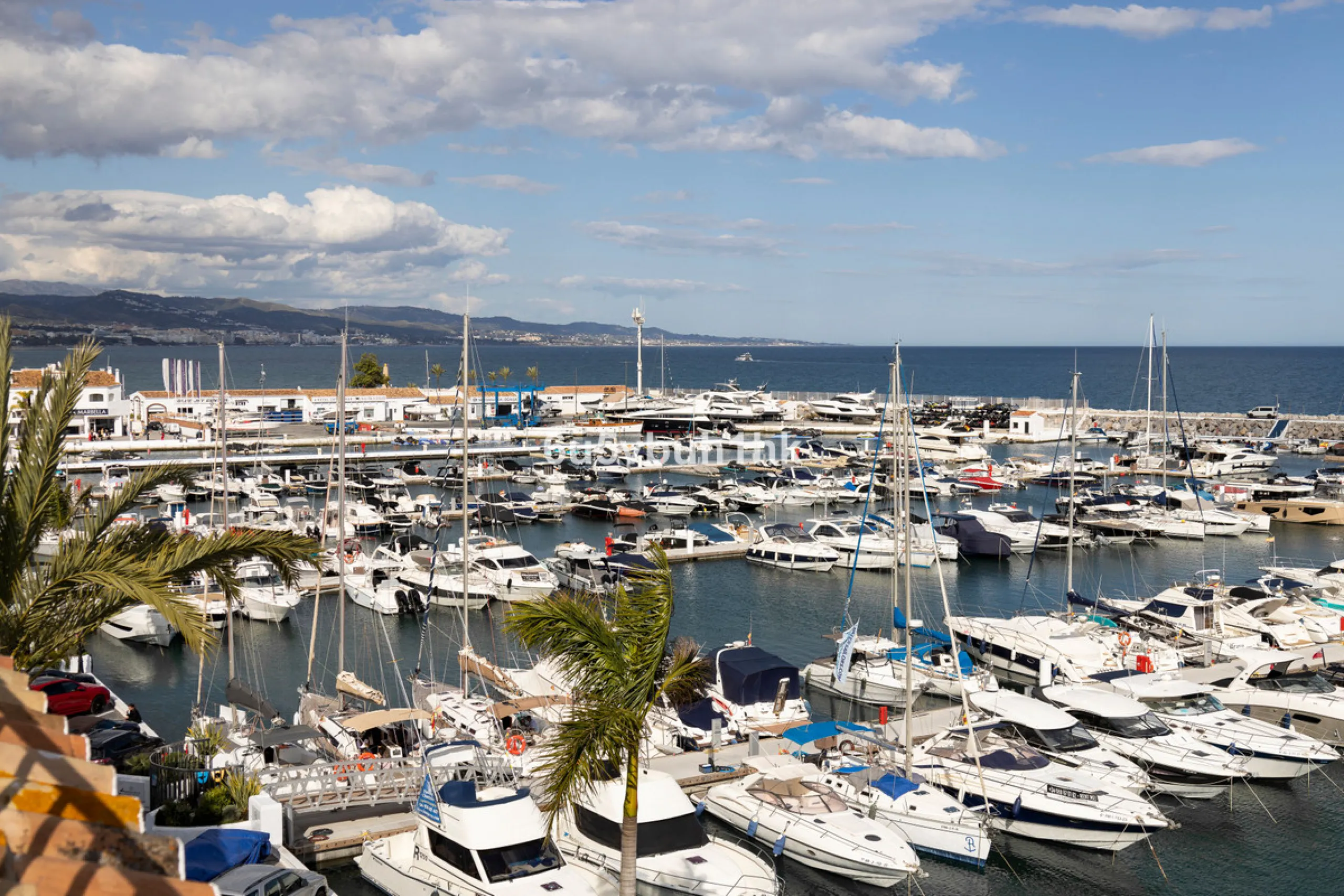 Discover this beautifully renovated duplex penthouse perfectly positioned in the vibrant heart of Puerto Banús, boasting spectacular views directly over the iconic marina.