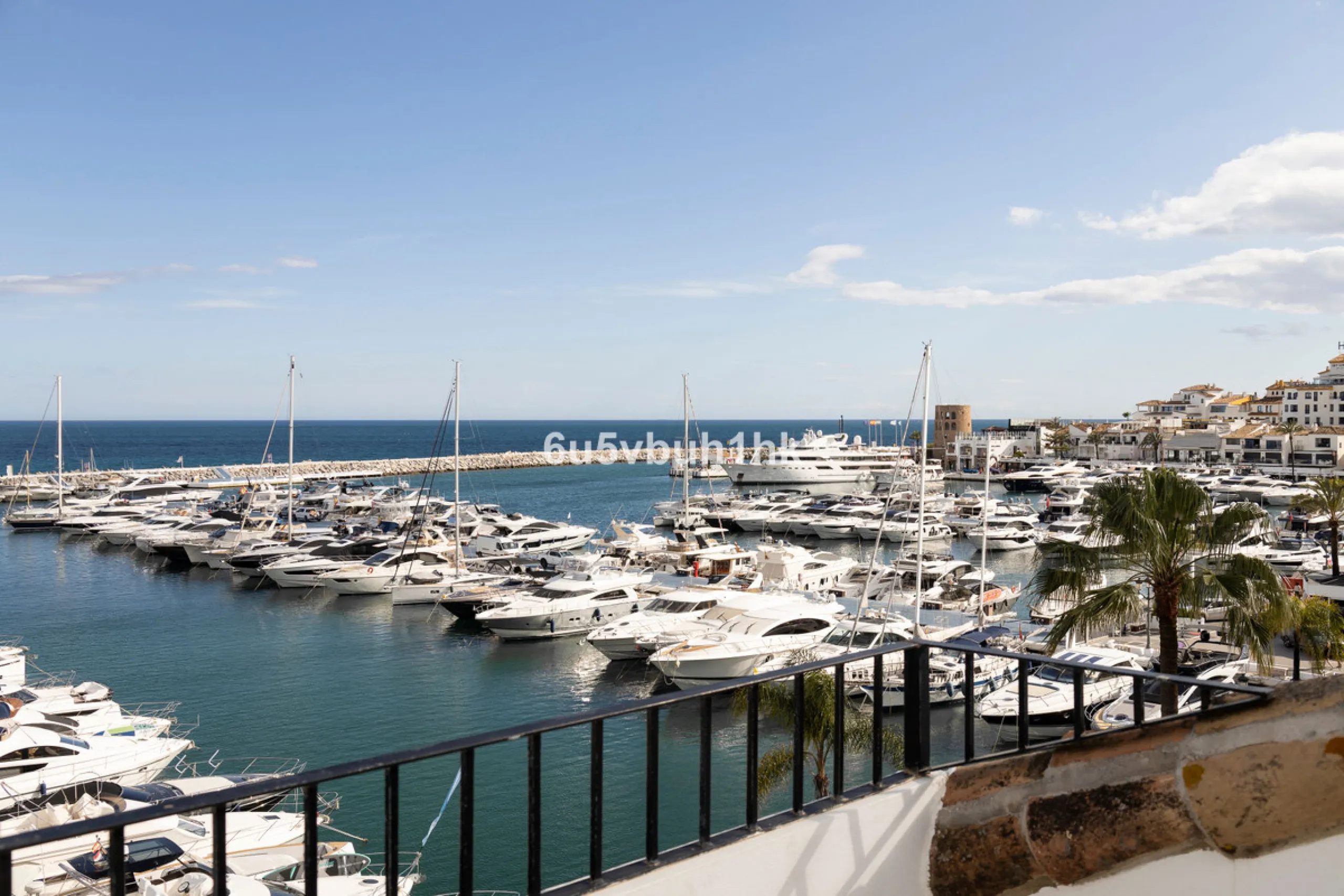 Discover this beautifully renovated duplex penthouse perfectly positioned in the vibrant heart of Puerto Banús, boasting spectacular views directly over the iconic marina.