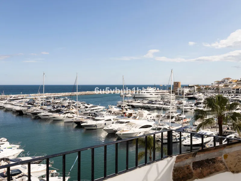 Discover this beautifully renovated duplex penthouse perfectly positioned in the vibrant heart of Puerto Banús, boasting spectacular views directly over the iconic marina.
