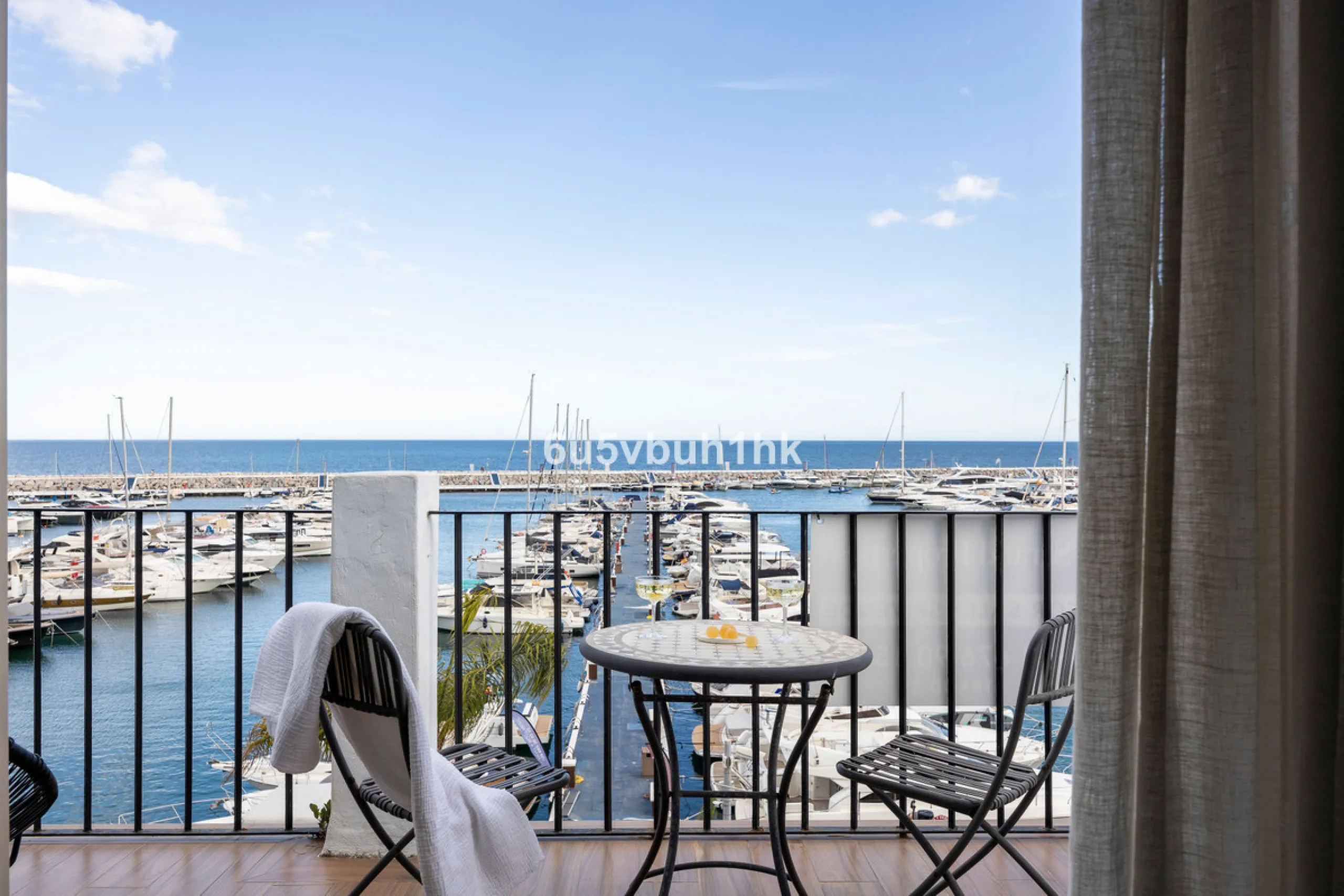 Discover this beautifully renovated duplex penthouse perfectly positioned in the vibrant heart of Puerto Banús, boasting spectacular views directly over the iconic marina.