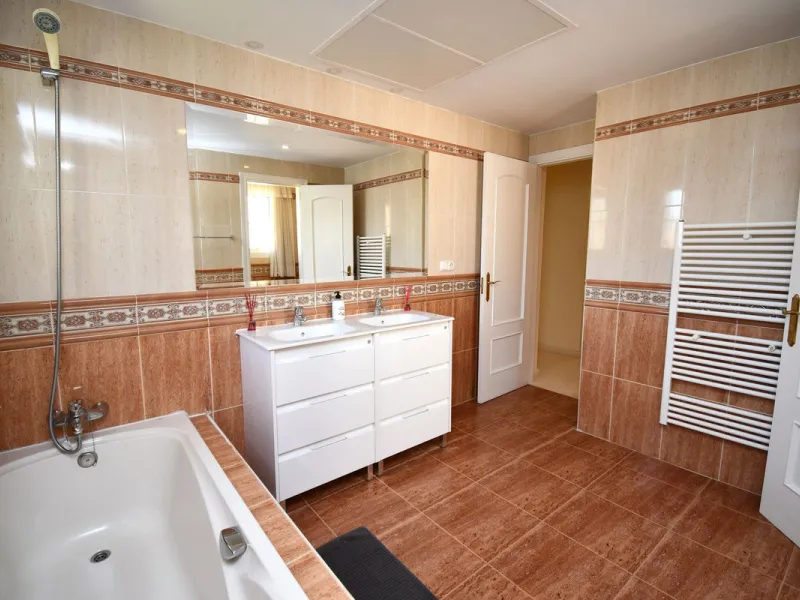 This impressive, front-line golf, 9 bedroom, 10 bathroom villa offers over 700m2 of living and entertainment space and sits on a spacious plot of 1,300m2.  This villa has 8 ensuite bedrooms, offering family/guests their own space and privacy.  All indoor 