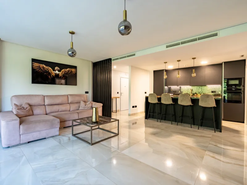 Welcome to this stunning property in the exclusive urbanization of La Alborada Homes in Benahavís. Completely renovated in 2022, this stylish apartment blends modern luxury, comfort, and a prime location with rental license already in place