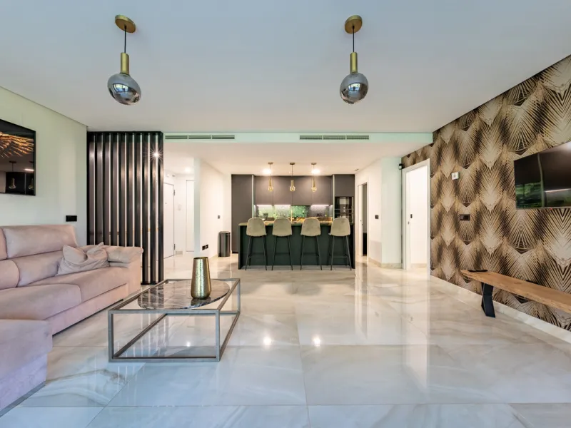 Welcome to this stunning property in the exclusive urbanization of La Alborada Homes in Benahavís. Completely renovated in 2022, this stylish apartment blends modern luxury, comfort, and a prime location with rental license already in place