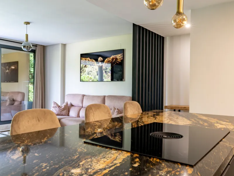 Welcome to this stunning property in the exclusive urbanization of La Alborada Homes in Benahavís. Completely renovated in 2022, this stylish apartment blends modern luxury, comfort, and a prime location with rental license already in place