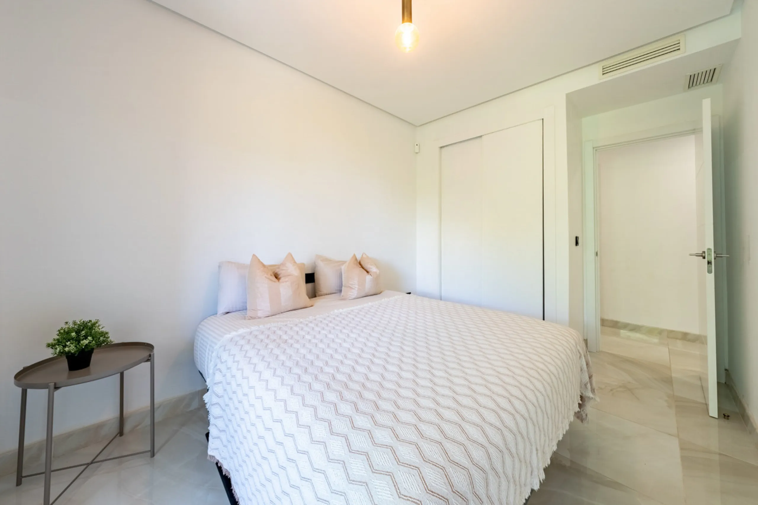 Welcome to this stunning property in the exclusive urbanization of La Alborada Homes in Benahavís. Completely renovated in 2022, this stylish apartment blends modern luxury, comfort, and a prime location with rental license already in place