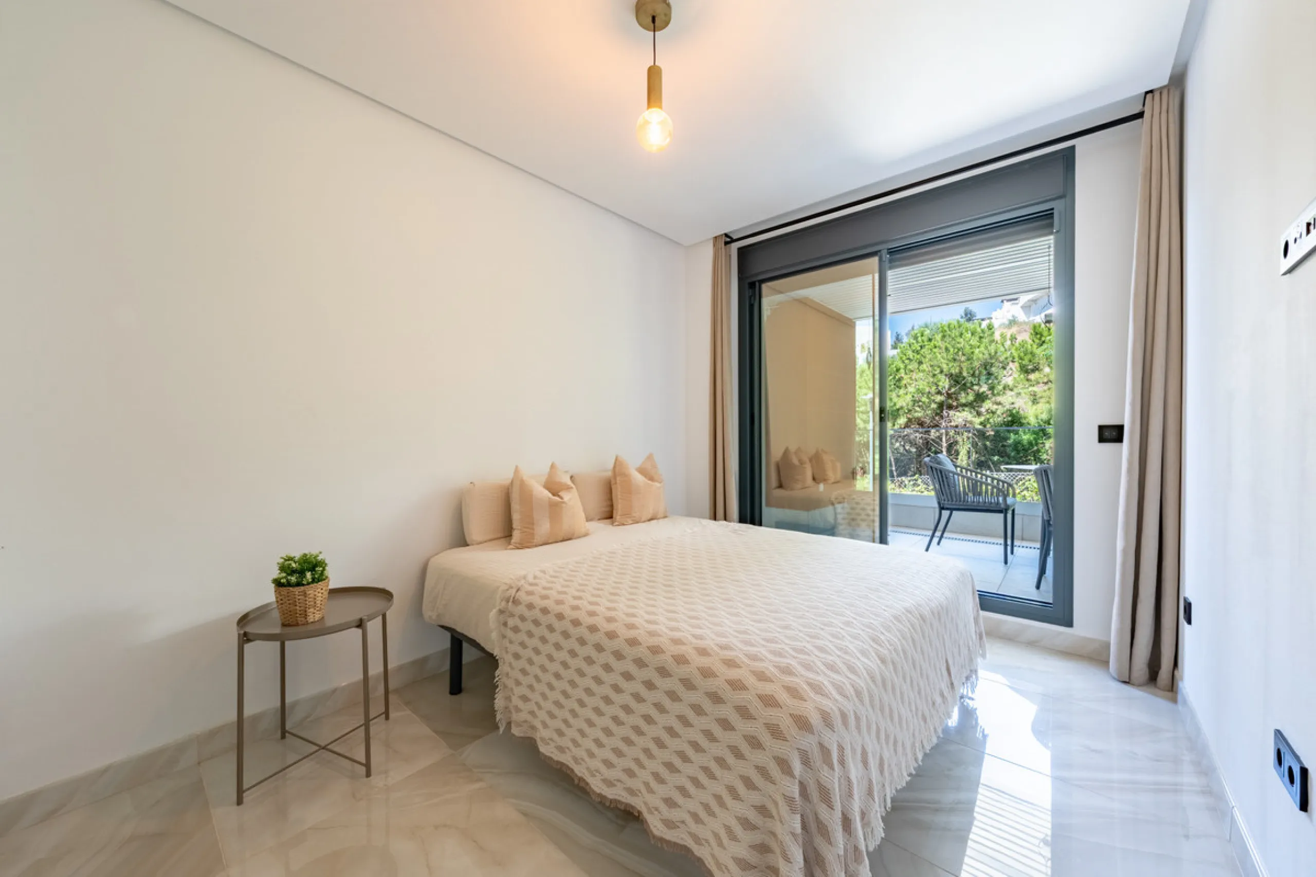 Welcome to this stunning property in the exclusive urbanization of La Alborada Homes in Benahavís. Completely renovated in 2022, this stylish apartment blends modern luxury, comfort, and a prime location with rental license already in place
