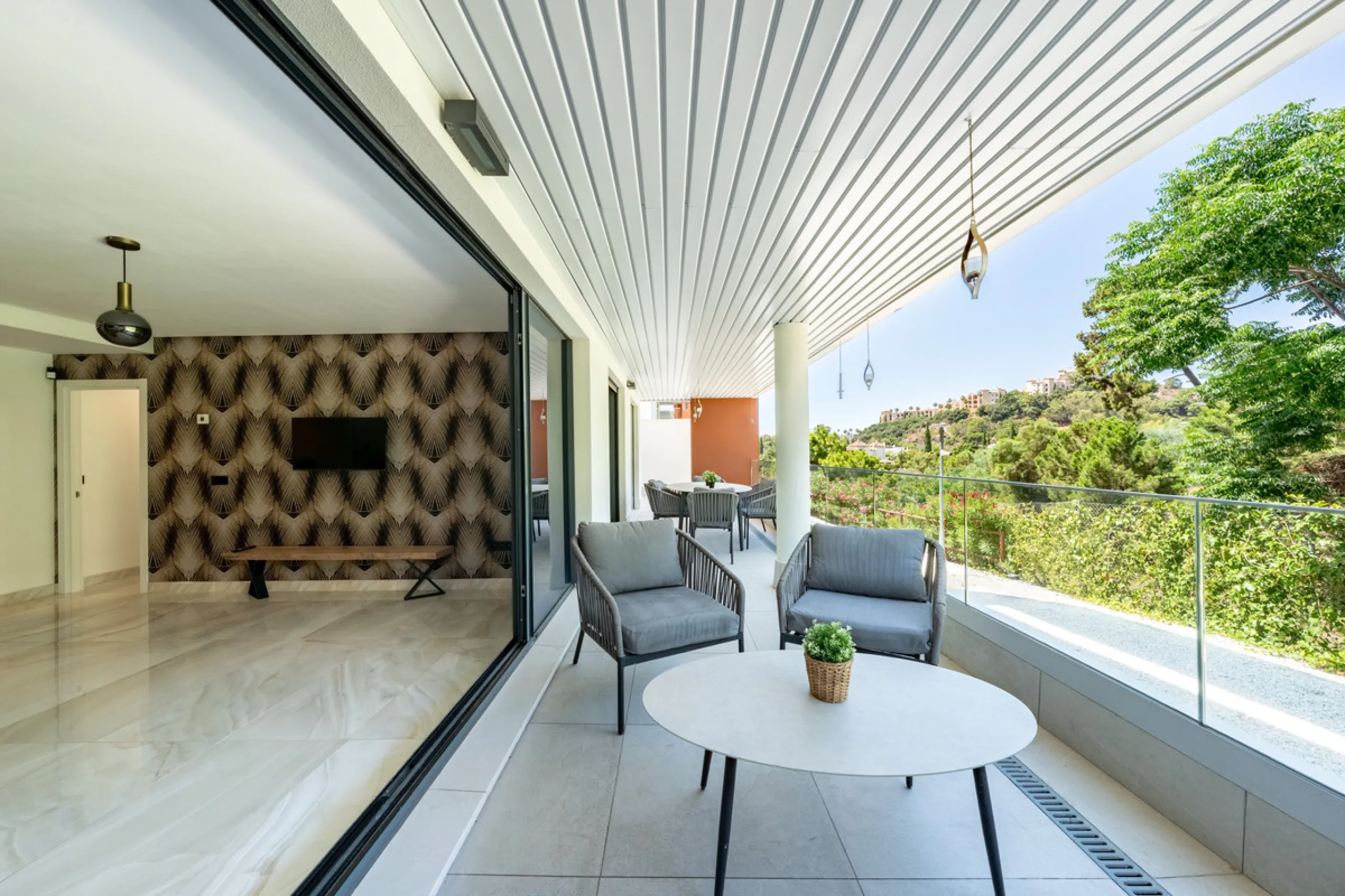 Welcome to this stunning property in the exclusive urbanization of La Alborada Homes in Benahavís. Completely renovated in 2022, this stylish apartment blends modern luxury, comfort, and a prime location with rental license already in place