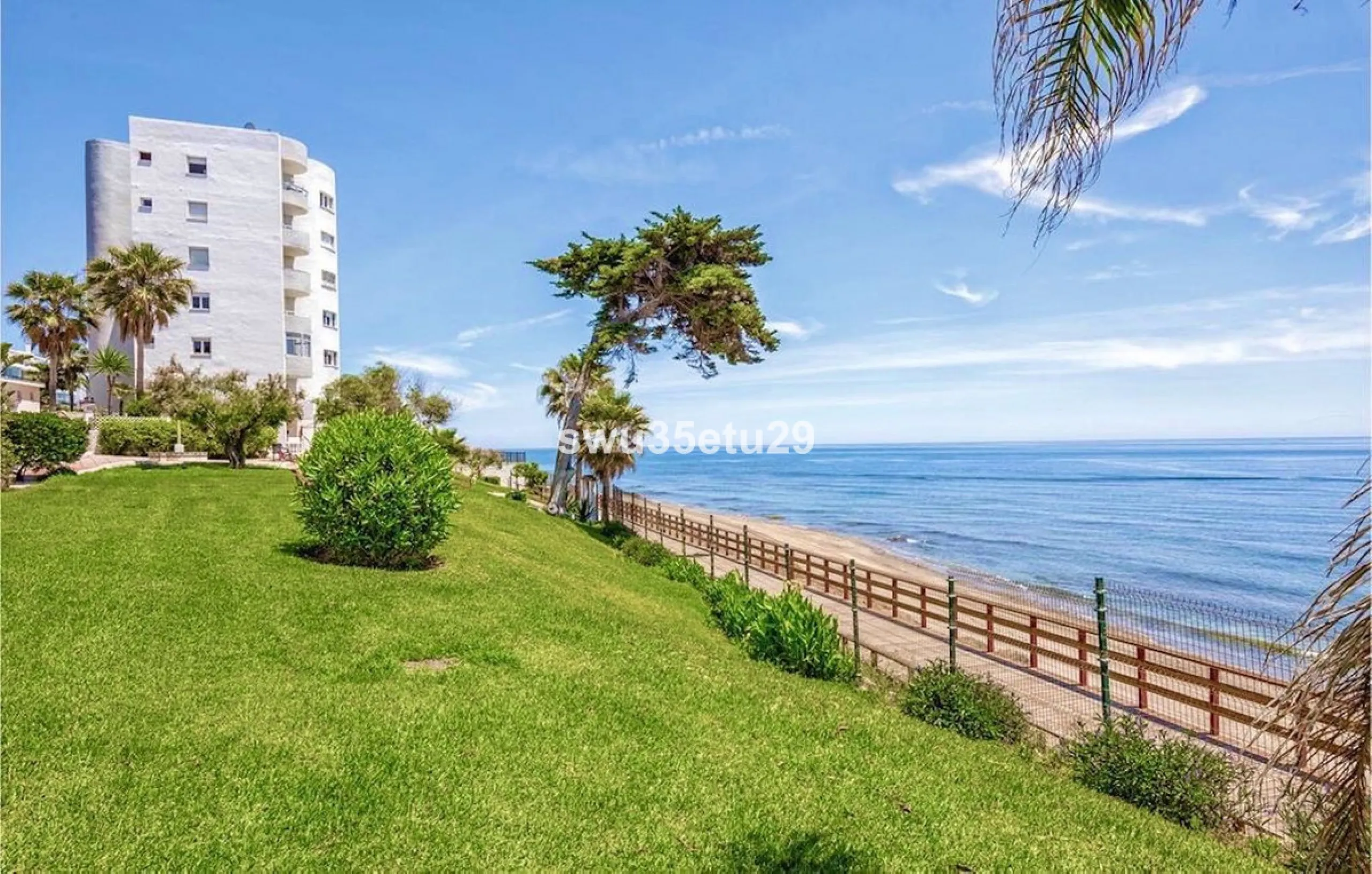 This fantastic first-line beach apartment with stunning sea views offers direct access to the communal gardens and beach.