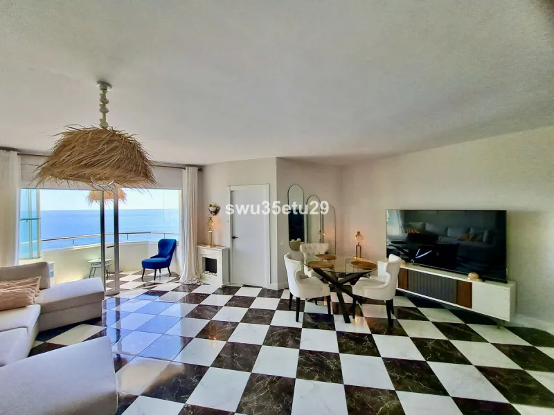 This fantastic first-line beach apartment with stunning sea views offers direct access to the communal gardens and beach.