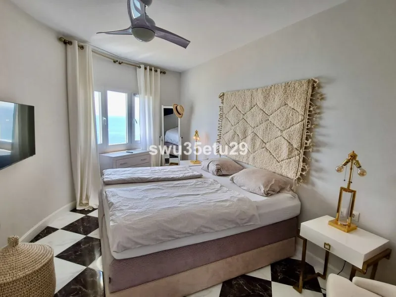 This fantastic first-line beach apartment with stunning sea views offers direct access to the communal gardens and beach.