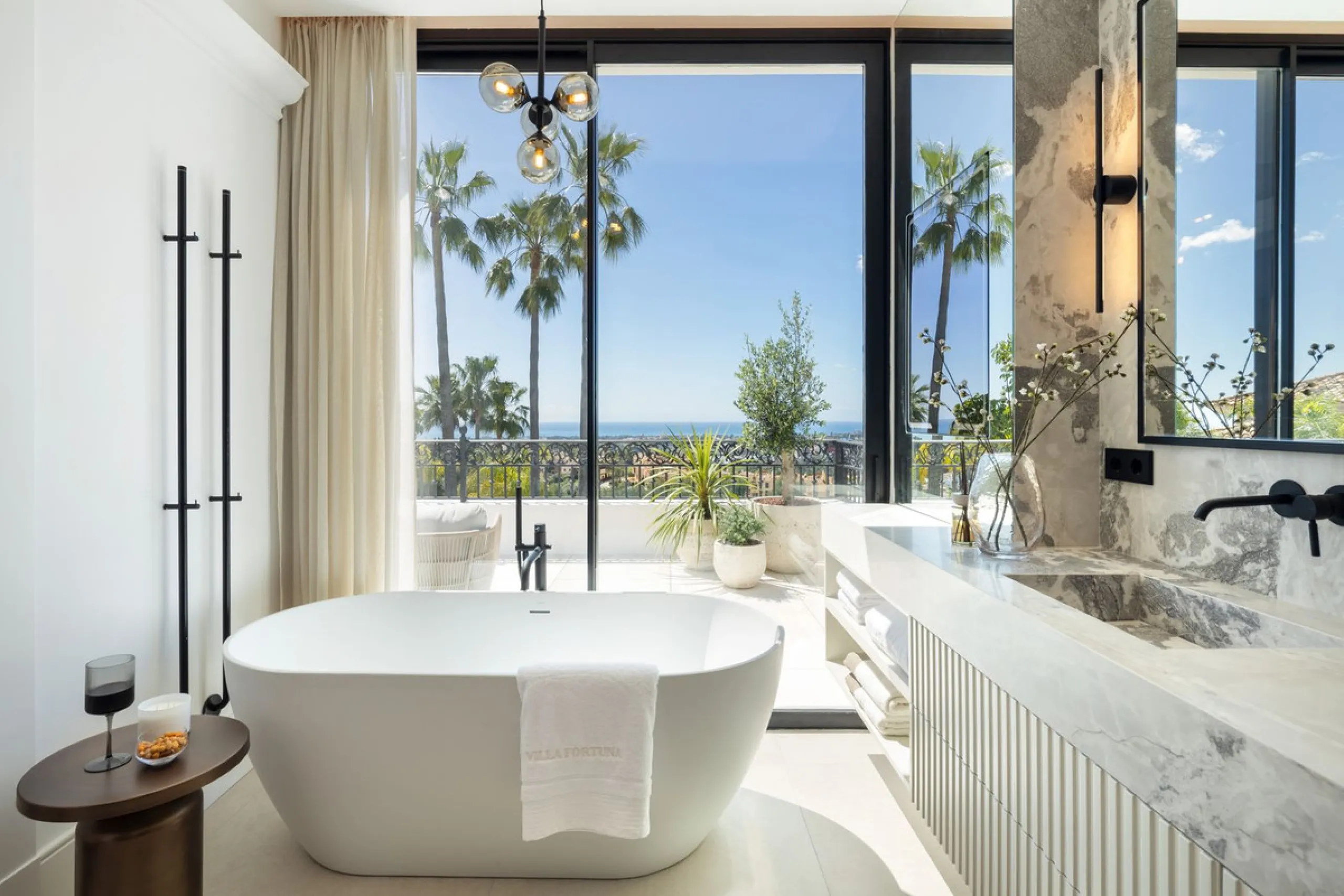 Discover this spectacular, fully renovated luxury villa located in the prestigious gated community of Los Arqueros, boasting breathtaking views over the renowned golf course. Blending timeless Mediterranean architecture with sleek contemporary elegance, t