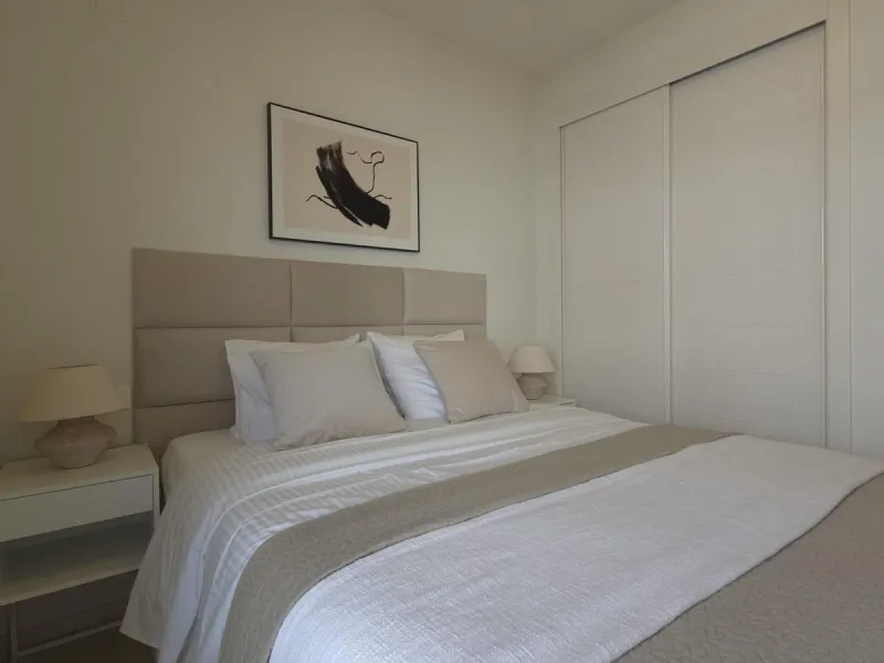 This elegant and sun-filled apartment is located in a peaceful and well-maintained residential area, just a short drive from the city center. Set near a renowned golf course, it's a perfect choice for those who enjoy a relaxed lifestyle with easy access t