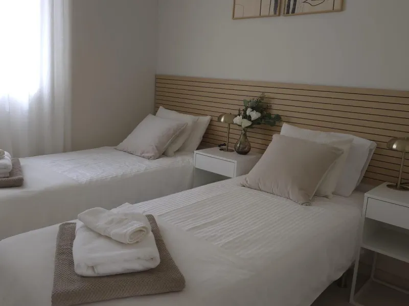This elegant and sun-filled apartment is located in a peaceful and well-maintained residential area, just a short drive from the city center. Set near a renowned golf course, it's a perfect choice for those who enjoy a relaxed lifestyle with easy access t