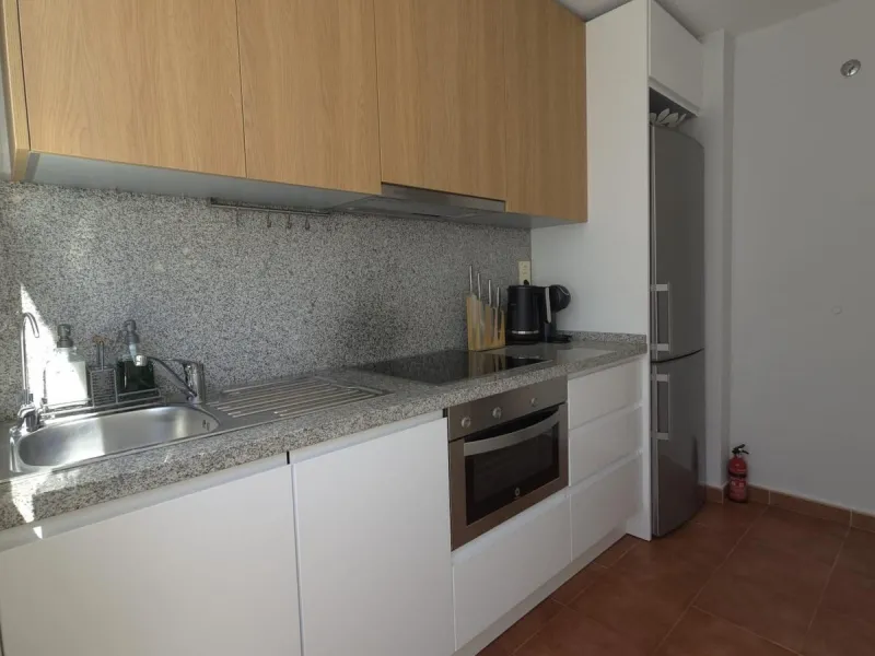 This elegant and sun-filled apartment is located in a peaceful and well-maintained residential area, just a short drive from the city center. Set near a renowned golf course, it's a perfect choice for those who enjoy a relaxed lifestyle with easy access t