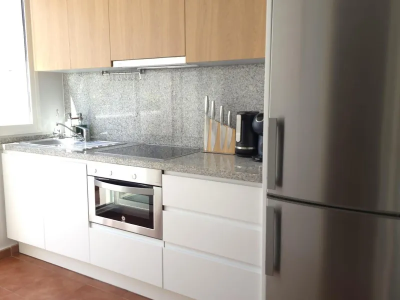 This elegant and sun-filled apartment is located in a peaceful and well-maintained residential area, just a short drive from the city center. Set near a renowned golf course, it's a perfect choice for those who enjoy a relaxed lifestyle with easy access t