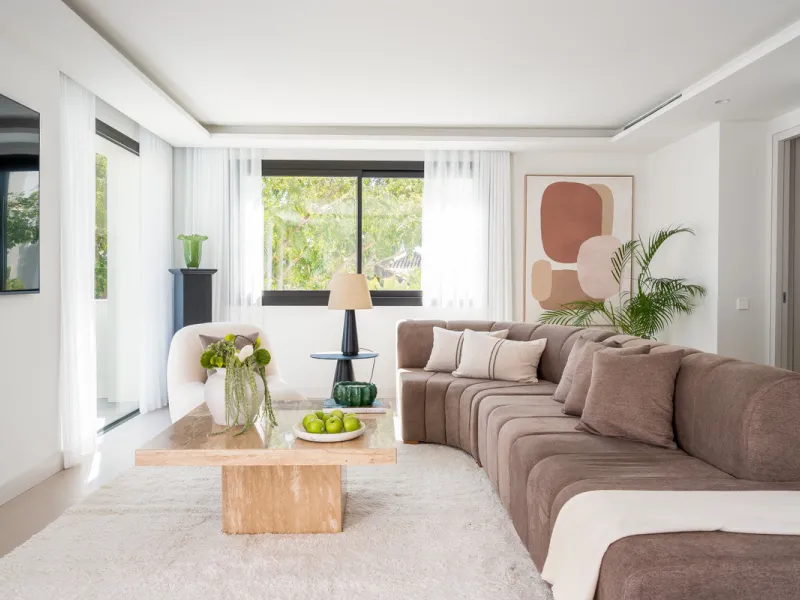 Welcome to a contemporary masterpiece located in the picturesque grounds of Los Naranjos Hill Club in La Cerquilla, Nueva Andalucía. This newly developed Andalusian-style villa offers privacy and elegance in a gated complex. The home's inviting interior i