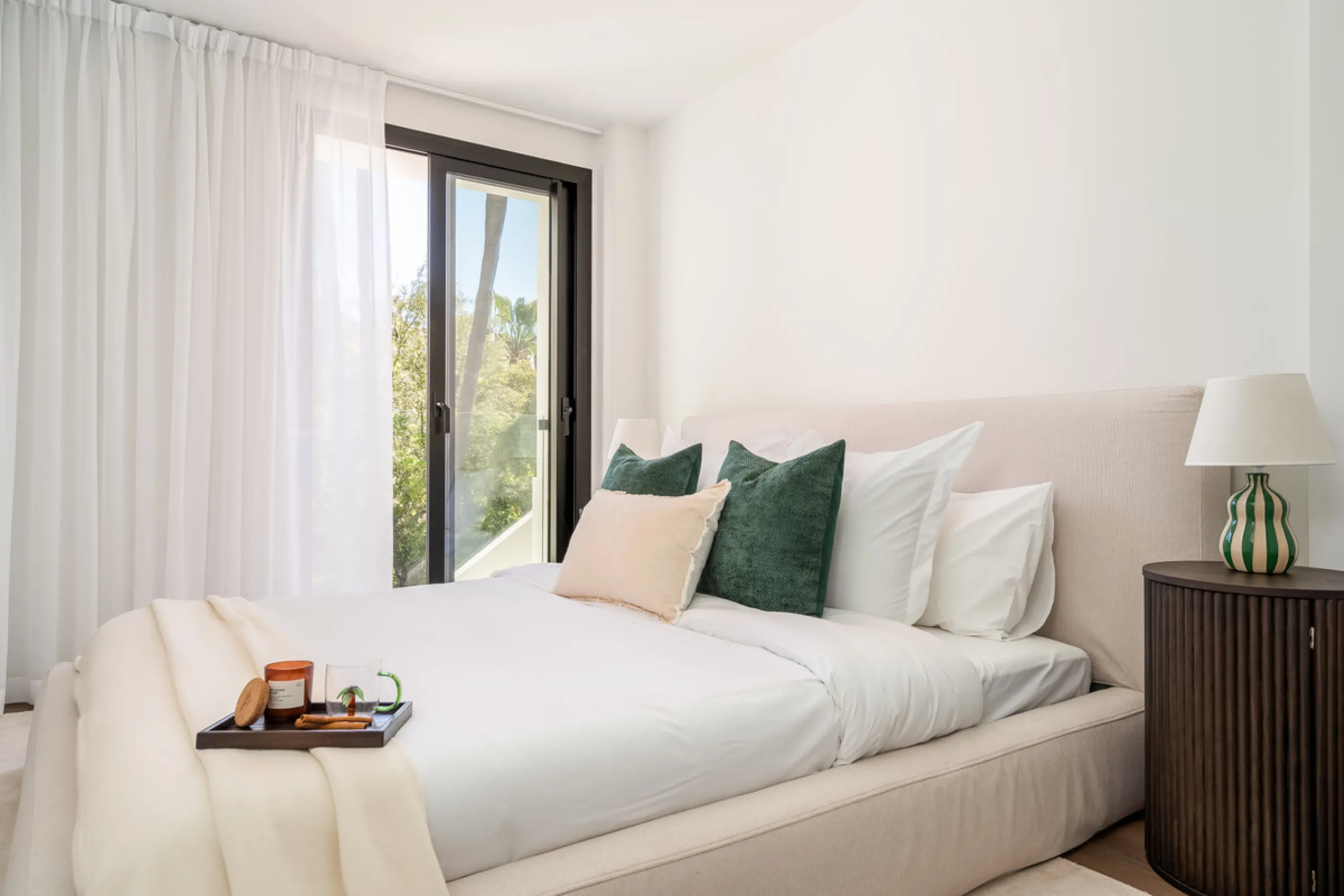 Welcome to a contemporary masterpiece located in the picturesque grounds of Los Naranjos Hill Club in La Cerquilla, Nueva Andalucía. This newly developed Andalusian-style villa offers privacy and elegance in a gated complex. The home's inviting interior i