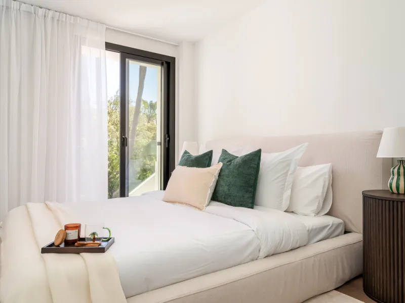 Welcome to a contemporary masterpiece located in the picturesque grounds of Los Naranjos Hill Club in La Cerquilla, Nueva Andalucía. This newly developed Andalusian-style villa offers privacy and elegance in a gated complex. The home's inviting interior i