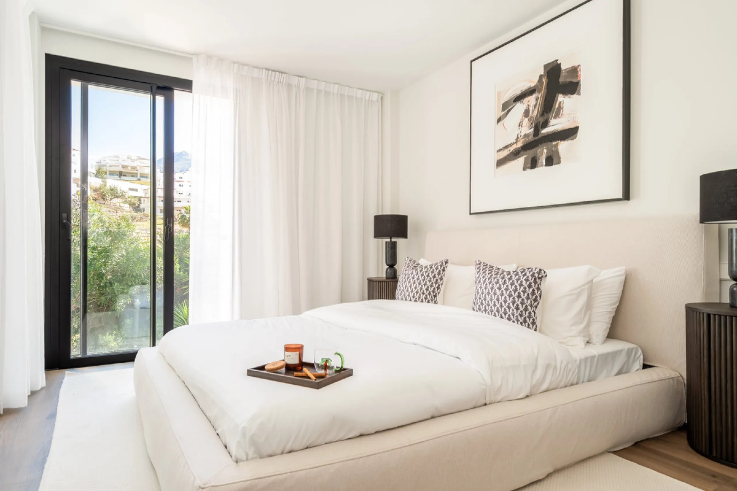 Welcome to a contemporary masterpiece located in the picturesque grounds of Los Naranjos Hill Club in La Cerquilla, Nueva Andalucía. This newly developed Andalusian-style villa offers privacy and elegance in a gated complex. The home's inviting interior i