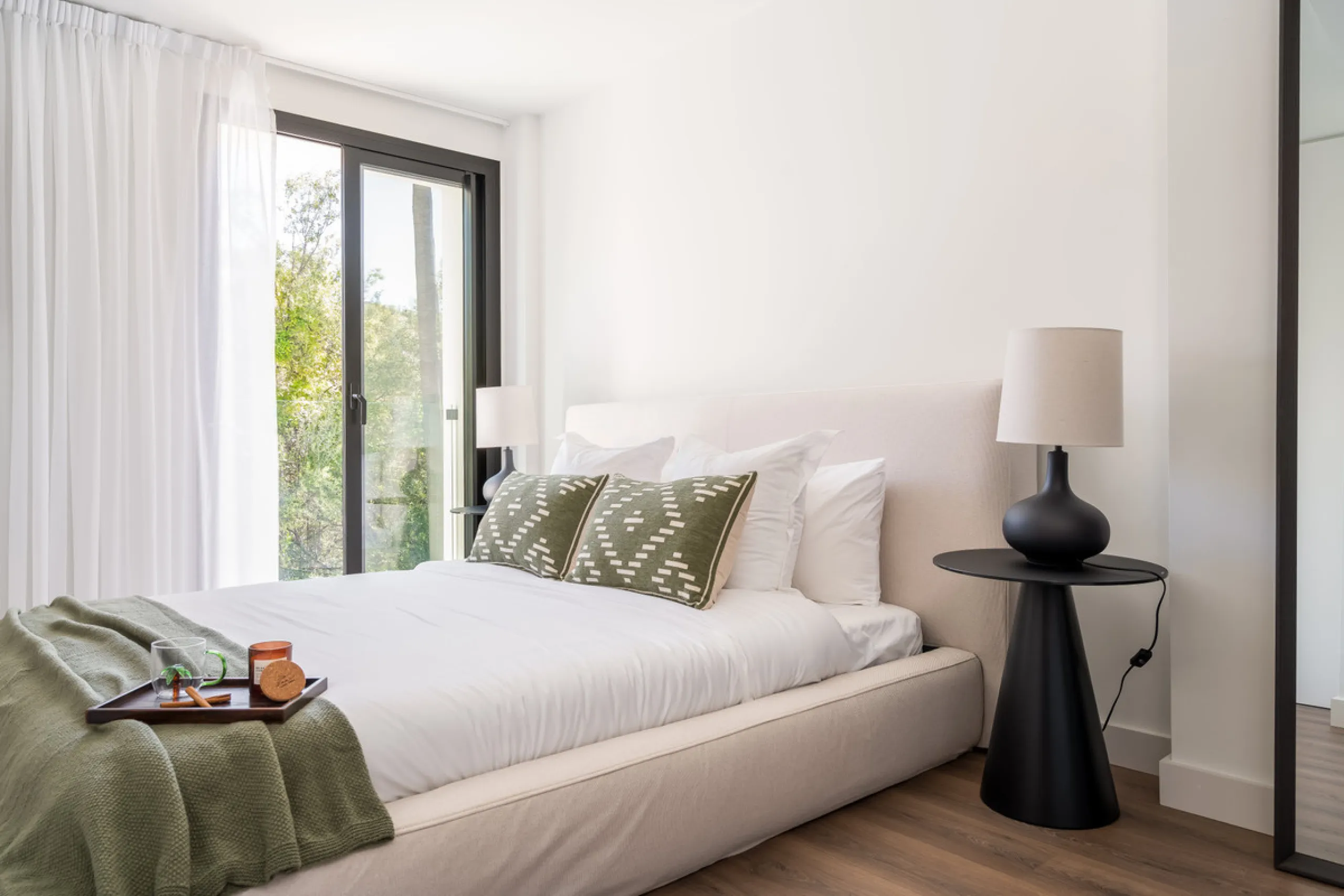Welcome to a contemporary masterpiece located in the picturesque grounds of Los Naranjos Hill Club in La Cerquilla, Nueva Andalucía. This newly developed Andalusian-style villa offers privacy and elegance in a gated complex. The home's inviting interior i