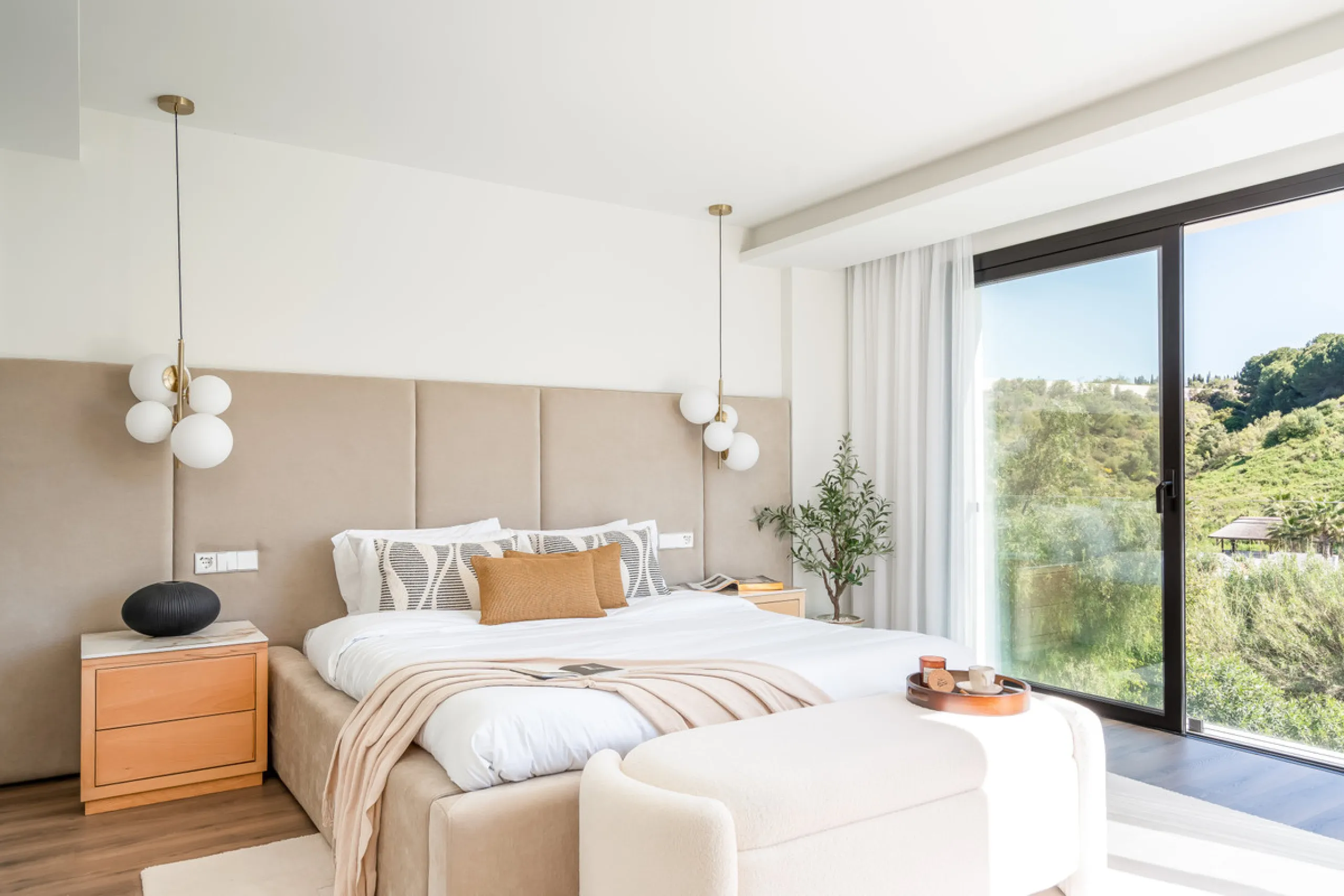 Welcome to a contemporary masterpiece located in the picturesque grounds of Los Naranjos Hill Club in La Cerquilla, Nueva Andalucía. This newly developed Andalusian-style villa offers privacy and elegance in a gated complex. The home's inviting interior i