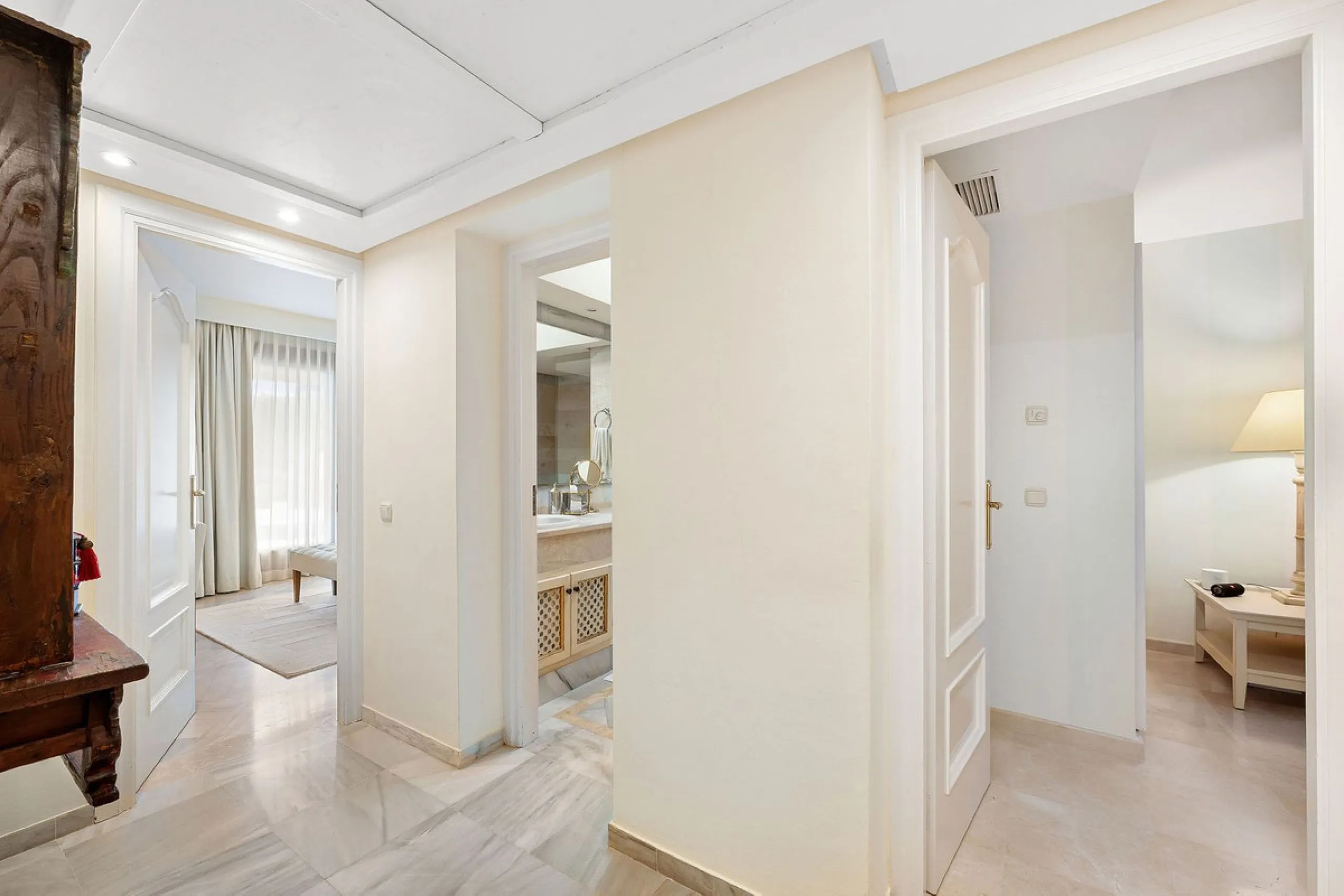 Rare opportunity to aquire a classic villa in perfect condition frontline to Royal Las Brisas Golf. As you enter you immediately feel that the house was built to very high standards where details and personal touches can be seen throughout. The main floor