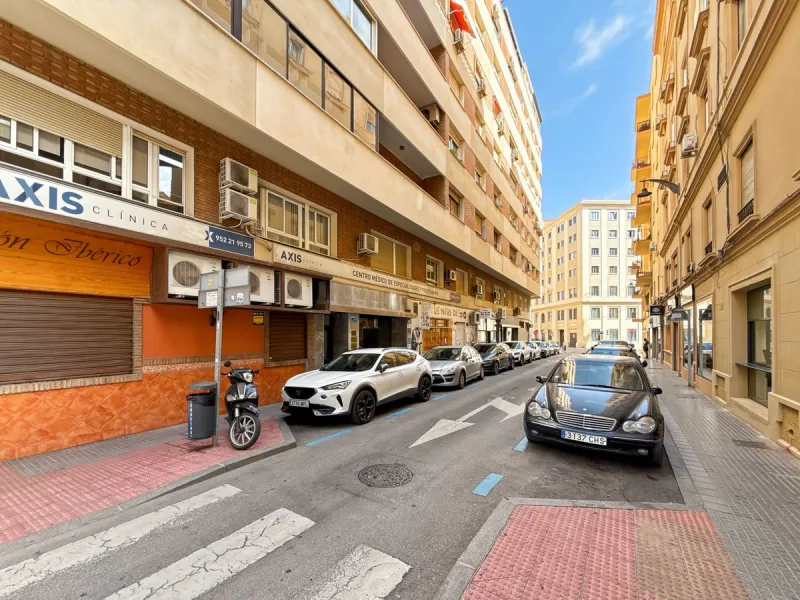 Some places can't be described by square meters or floor plans. They're described by how they make you feel the moment you walk in. This flat on Calle San Lorenzo, right in the beating heart of Málaga's Soho, has something rare — it has soul.