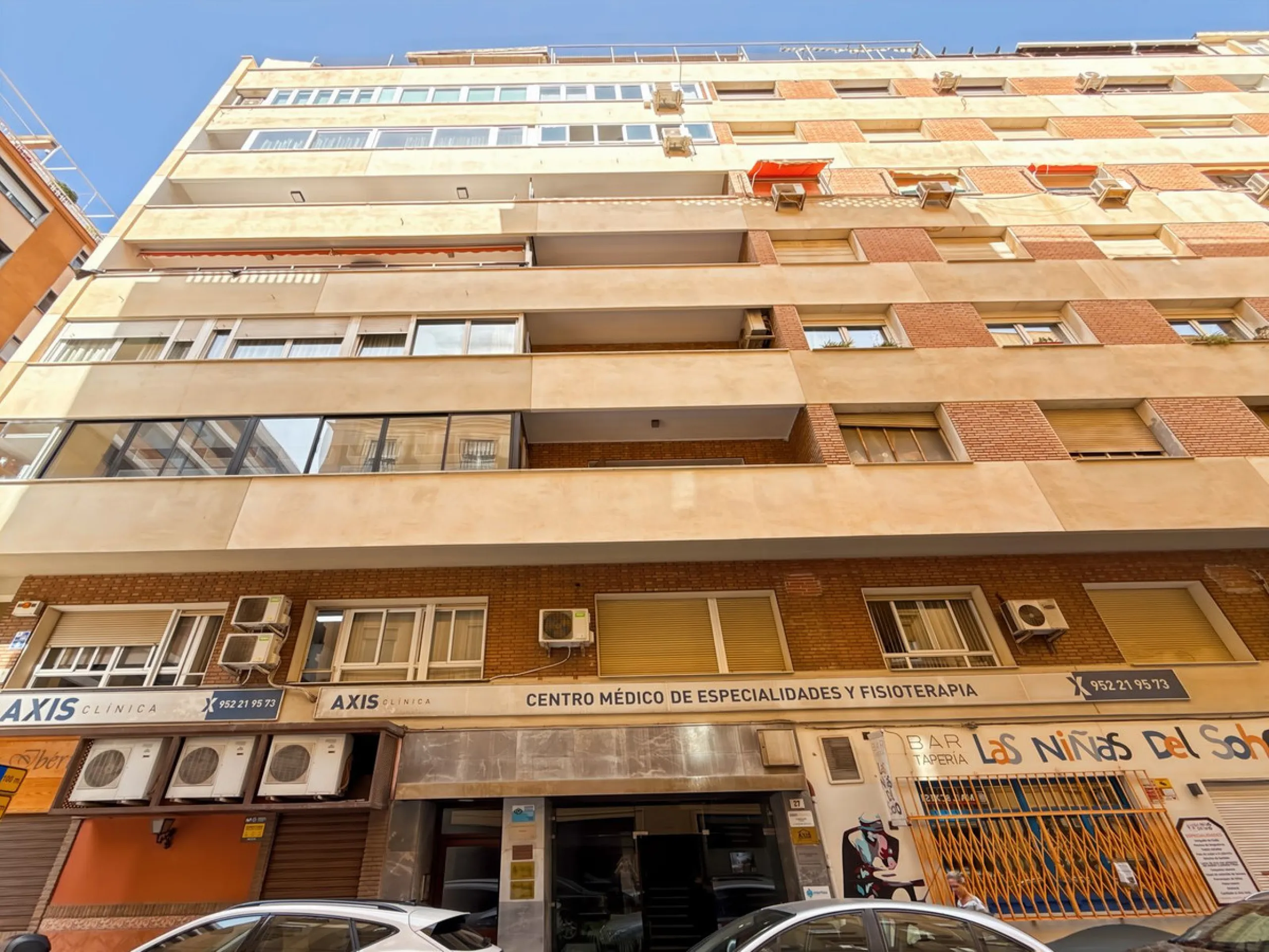 Some places can't be described by square meters or floor plans. They're described by how they make you feel the moment you walk in. This flat on Calle San Lorenzo, right in the beating heart of Málaga's Soho, has something rare — it has soul.