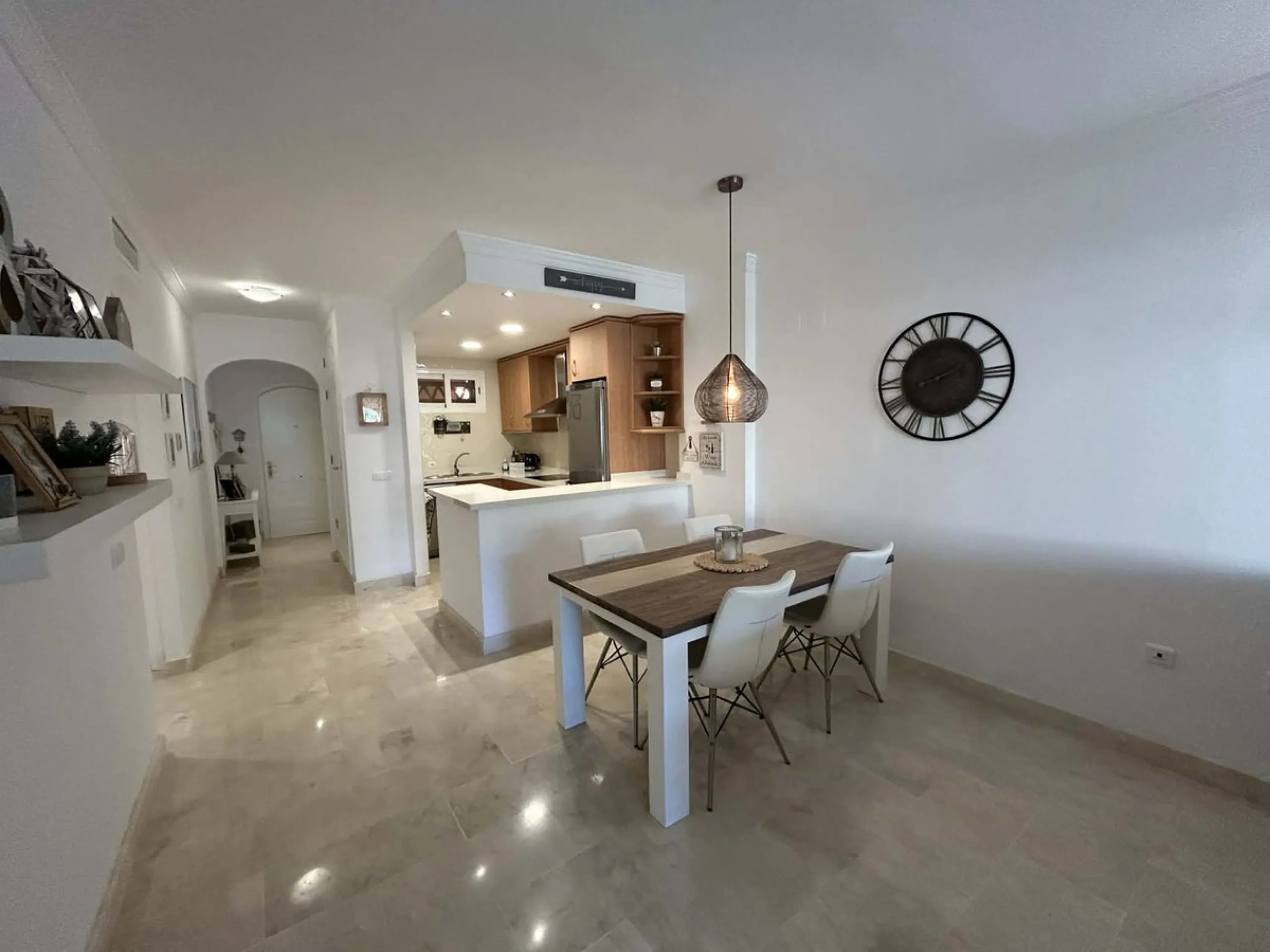 Elegant and bright west facing apartment situated in Santa Maria Village, a gated 24hour security community nested in Elviria, only minutes away from Marbella's nicest sandy beaches. This immaculate apartment combines comfort, style and convenience and fe