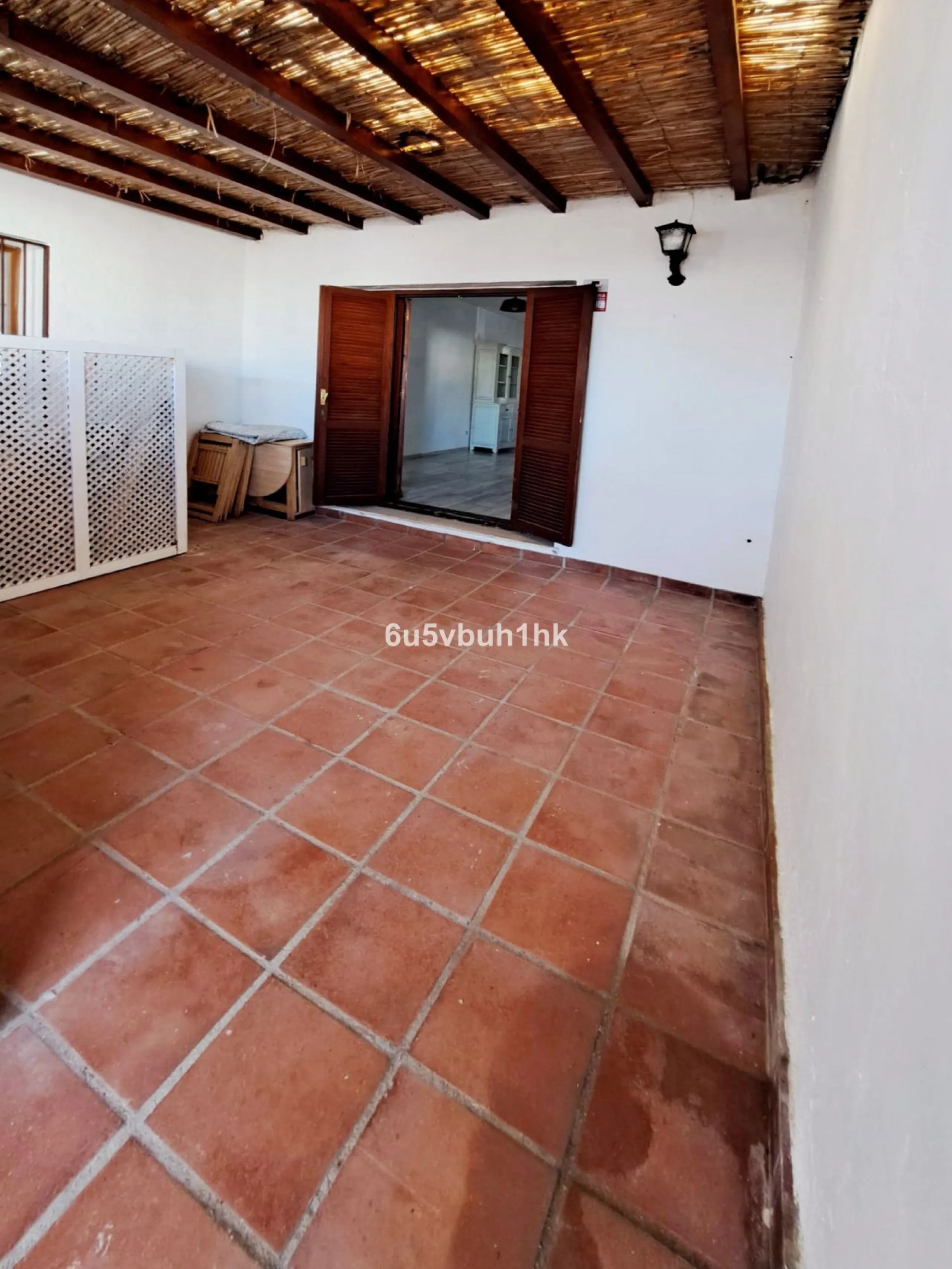 Located in the established Bahia Azul urbanisation, this traditional Spanish house offers an excellent opportunity to acquire a property with direct access to the beach and communal amenities.