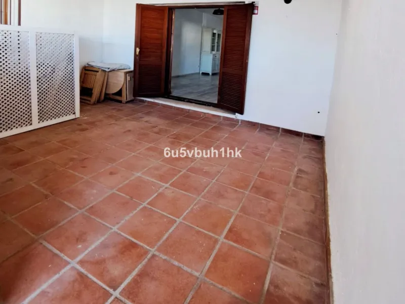 Located in the established Bahia Azul urbanisation, this traditional Spanish house offers an excellent opportunity to acquire a property with direct access to the beach and communal amenities.