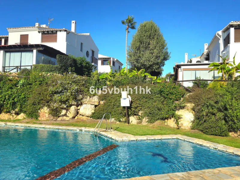 Located in the established Bahia Azul urbanisation, this traditional Spanish house offers an excellent opportunity to acquire a property with direct access to the beach and communal amenities.