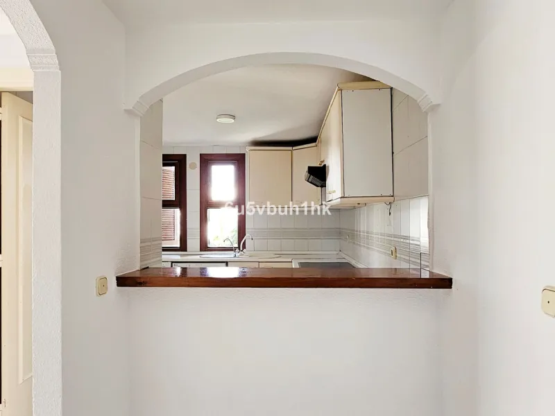 Located in the established Bahia Azul urbanisation, this traditional Spanish house offers an excellent opportunity to acquire a property with direct access to the beach and communal amenities.