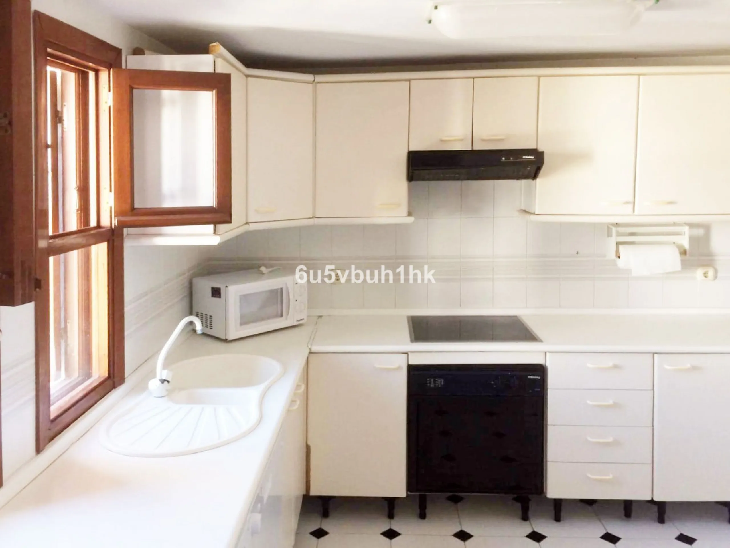 Located in the established Bahia Azul urbanisation, this traditional Spanish house offers an excellent opportunity to acquire a property with direct access to the beach and communal amenities.
