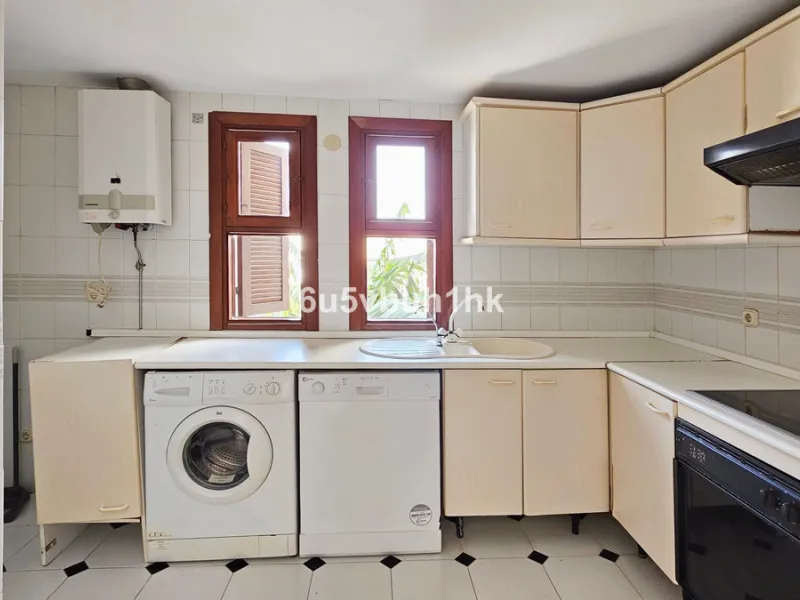 Located in the established Bahia Azul urbanisation, this traditional Spanish house offers an excellent opportunity to acquire a property with direct access to the beach and communal amenities.